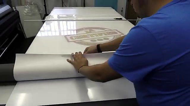 Grey Rollman-class laminator feeding print (SKU ask)