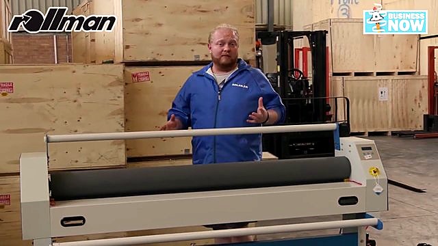 Presenter behind white Rollman on casters (SKU ask)