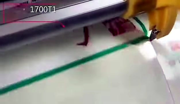 Side edge trimmer cutting laminated sheet (SKU ask)