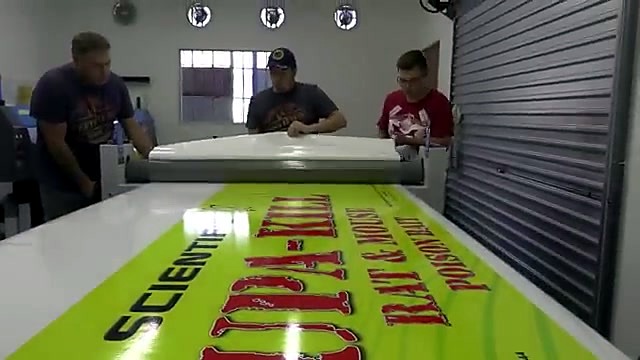 CLEAR laminator rollers feeding SUPA-KILL vinyl print (SKU ask)