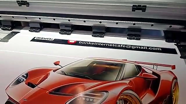 Red sports-car graphic on roll (SKU ask)