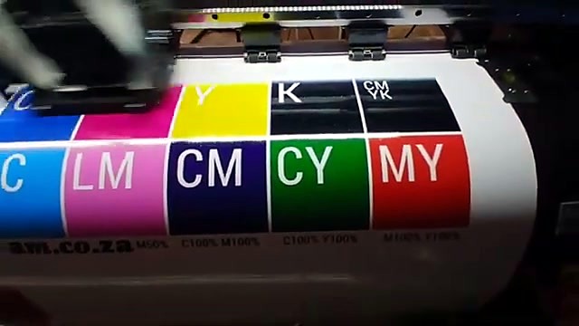 FastCOLOUR carriage over roll media during setup test