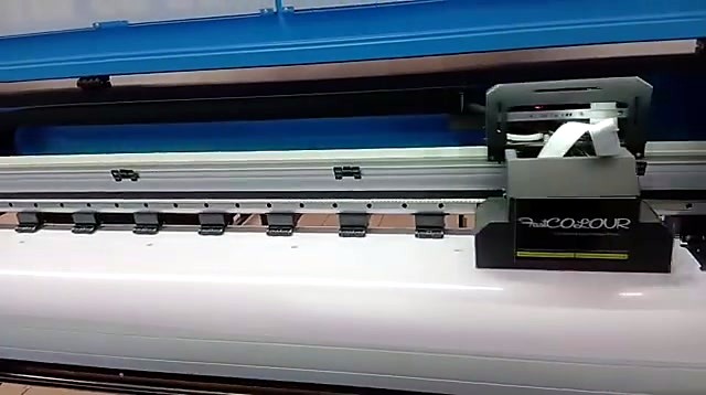FastCOLOUR-branded printhead carriage on the F1-1800 rail
