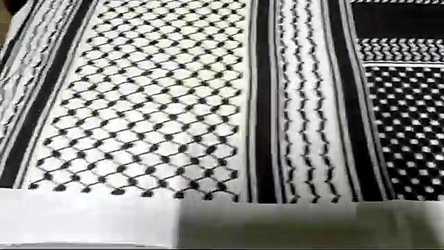 Close of printed geometric + flag motif (SKU ask)