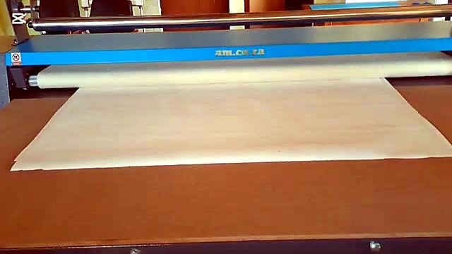 am.co.za blue-beam calender feeding white media (SKU ask)