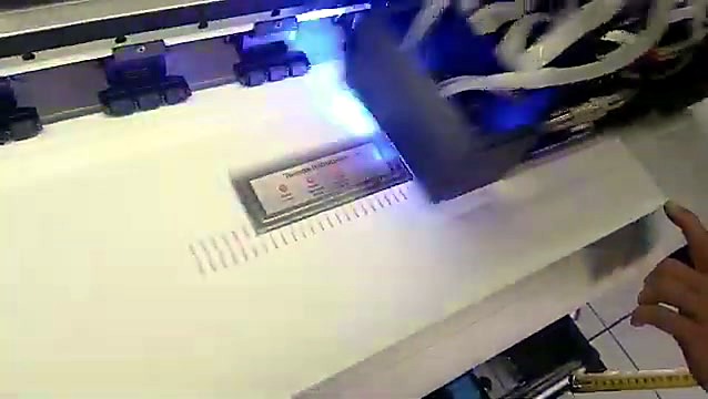 UV carriage with curing glow over vinyl