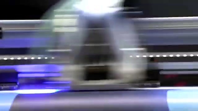 Carriage motion blur over media with blue LED (SKU ask)