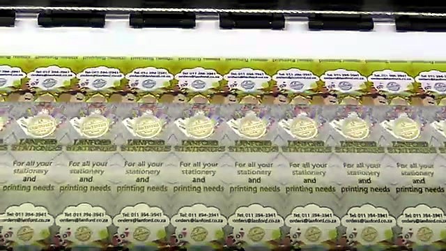 Glossy photo paper emerging with Lanford Stationers print (SKU ask)