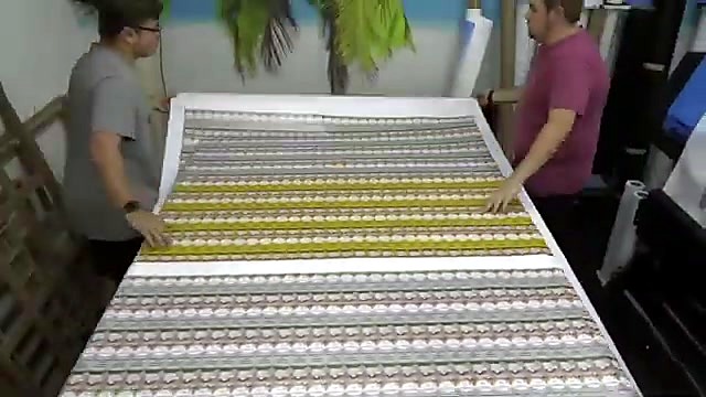 Wide printed bookmark sheet held in workshop (SKU ask)