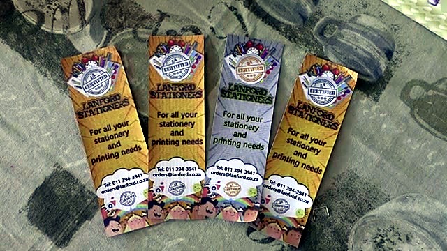 Finished color-header bookmarks laid out (SKU ask)