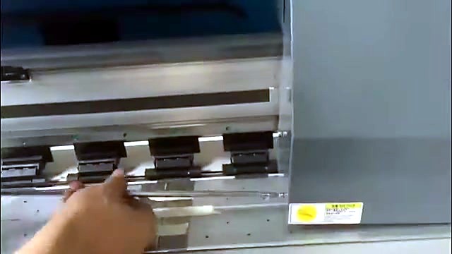 Pinch rollers + yellow CAUTION on carriage rail (SKU ask)