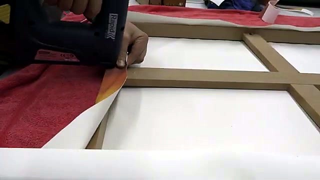 Pneumatic staple gun securing gallery wrap (SKU ask)