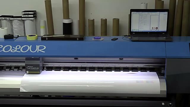 Large-format print onto white roll + laptop (SKU ask)