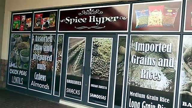 Finished Spice Hyper storefront window wrap (SKU ask)
