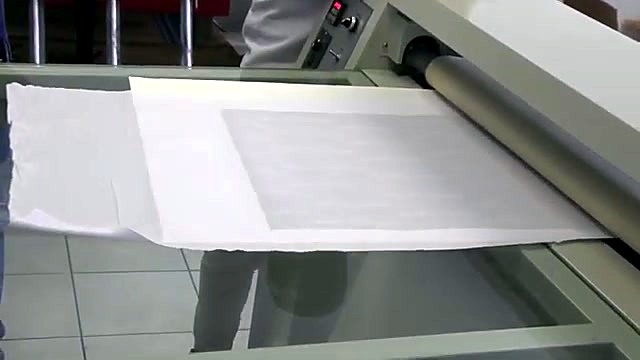 Roller/calender heat press feeding white sheet (SKU ask)