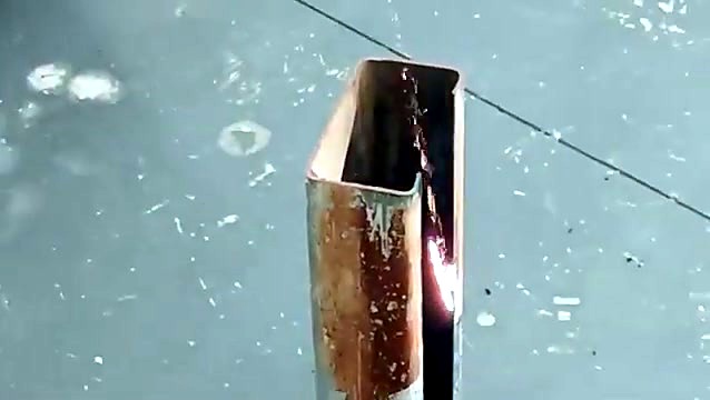 Laser rust-off on an upright rusty steel channel
