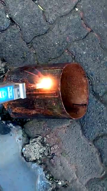 Handheld RustOff nozzle cleaning rusted steel tube (SKU ask)