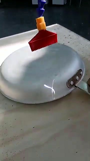 Shiny cleaned pan bottom after RustOff (SKU ask)