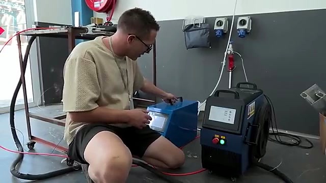 Dual blue AccuWeld cabinets on casters (family locked)