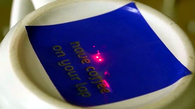 Blue marking paper laser-etched on mug base (SKU ask)