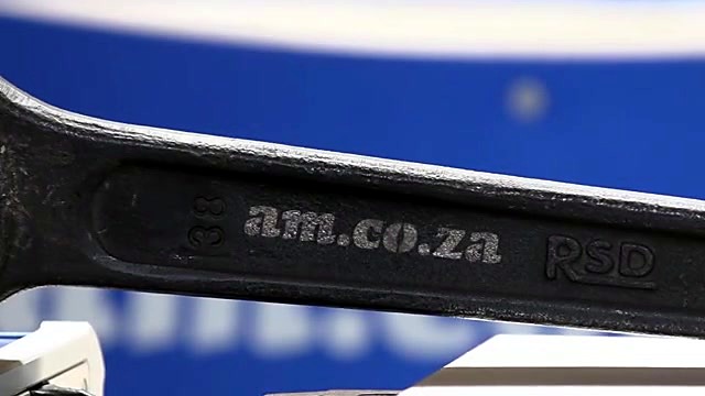 Finished am.co.za mark on cast-iron spanner (SKU ask)