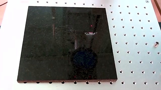 Dark marble tile on marker bed + red guide (SKU ask)
