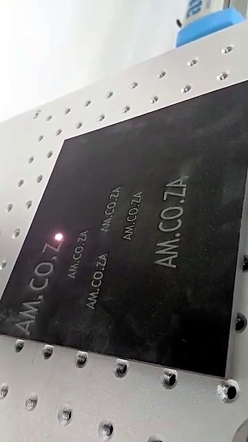 Completed AM.CO.ZA marks on black plate (SKU ask)