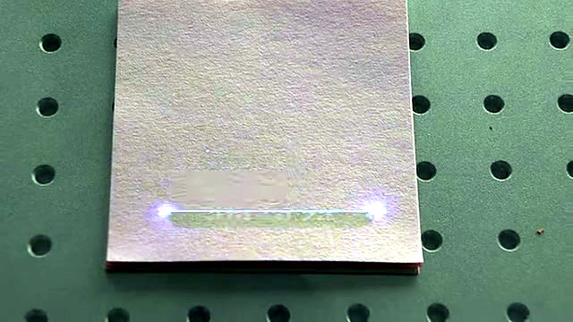 Purple UV mark spots on sheet on grid bed (SKU ask)