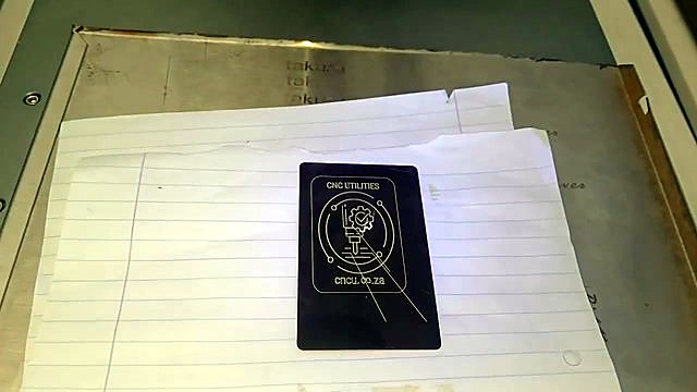 Finished CNCU logo UV-marked on black card (SKU ask)