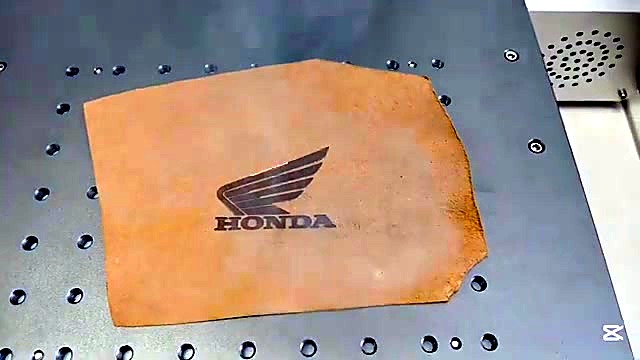 Honda on tan leather sample (SKU ask)