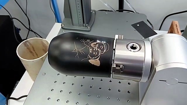 Mid rotary UV engraving line-art on bottle (SKU ask)