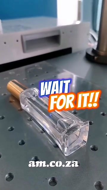 Perfume bottle on perforated UV bed (SKU ask)