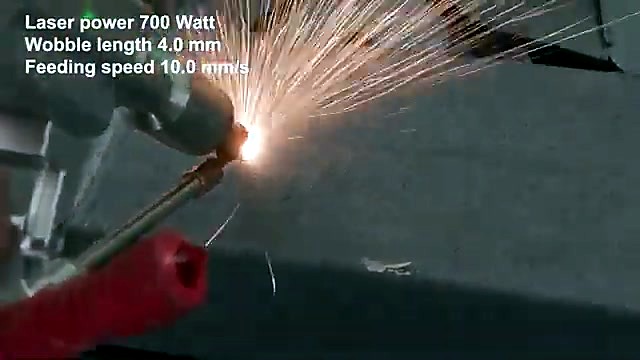 Weld sparks with 700W length/speed overlay — process observe-only