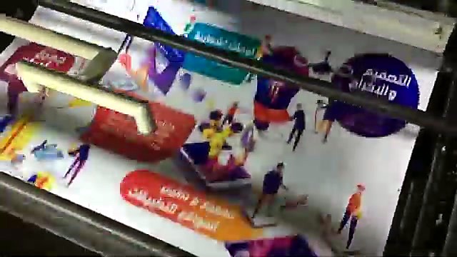Full-colour printed poster sheet coming through the delivery of the GL4-6245/N four-station offset printer