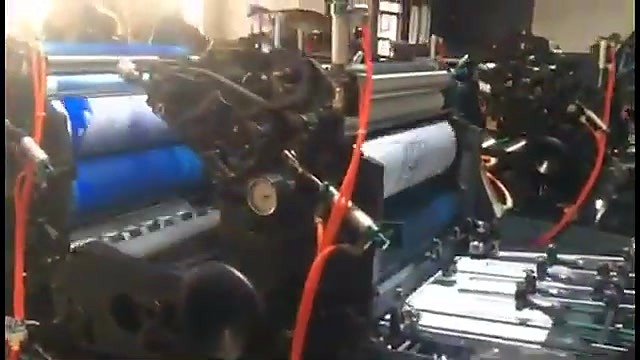 Four-station inking units with blue and yellow ink rollers on the GL4-6245/N Gutenberg Hamada offset press