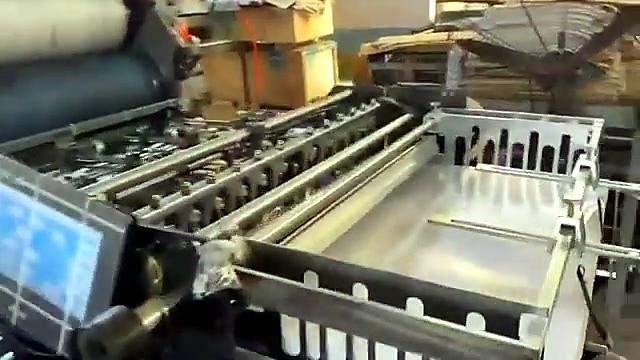 Sheet feeder and delivery table of the GL4-6245/N Gutenberg Hamada four-station offset printer