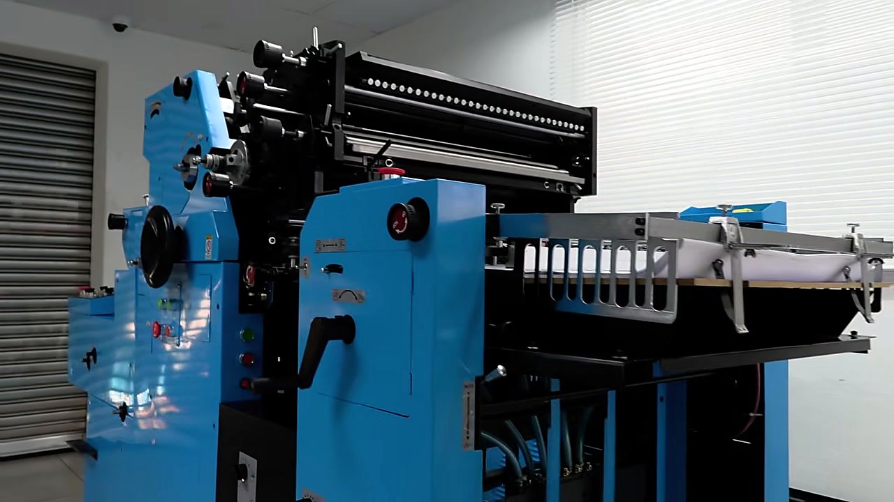 Blue offset press side view: rollers/mech path (SKU ask)