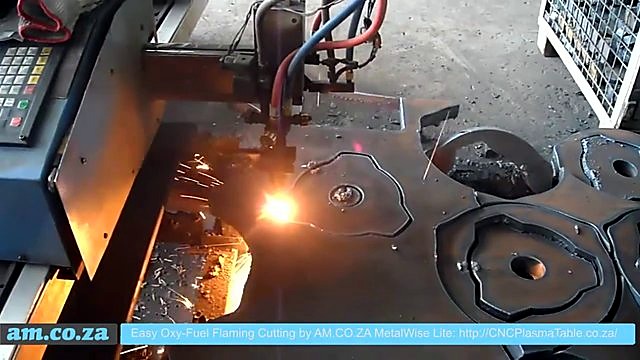 Oxy-fuel torch + red/blue hoses cutting thick plate (SKU ask)
