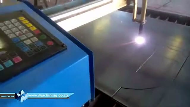 Blue control box + plasma arc mid-cut (SKU ask)