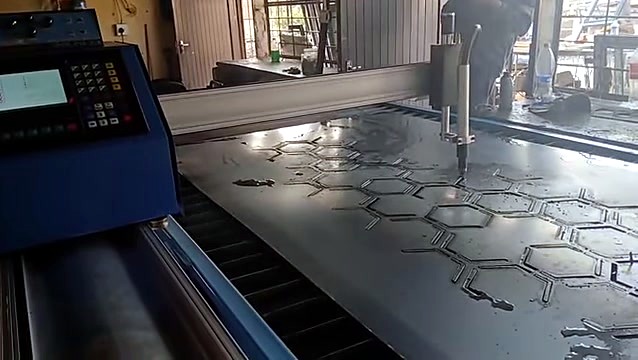 Wide: blue MetalWise controller + plasma table hex cut (SKU ask)