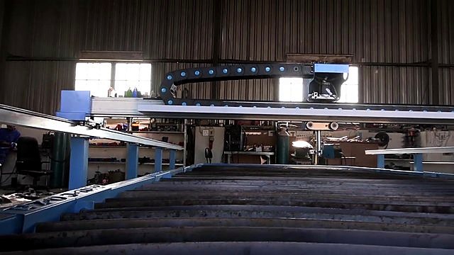 Wide blue gantry over long wavy-slat bed (SKU ask)