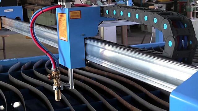 Oxy-fuel torch red+blue hoses on blue carriage (SKU ask)