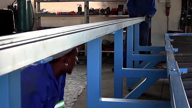 Silver linear rail positioned onto blue plasma frame (SKU ask)