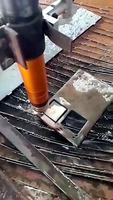 Copper-coloured plasma nozzle over plate (SKU ask)