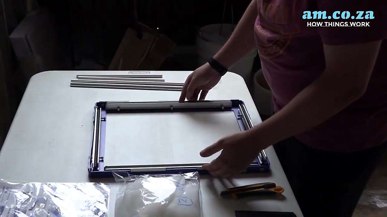 Blue MeshMaster frame + loose silver bars on bench (SKU ask)