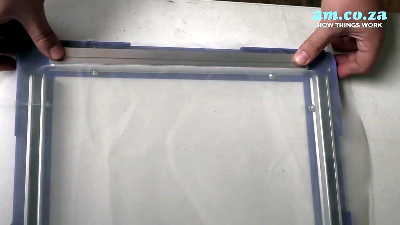 Aligning silver bar over white mesh in channel (SKU ask)