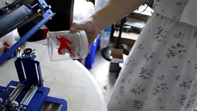 Finished clear jar with red screen-printed graphic (SKU ask)