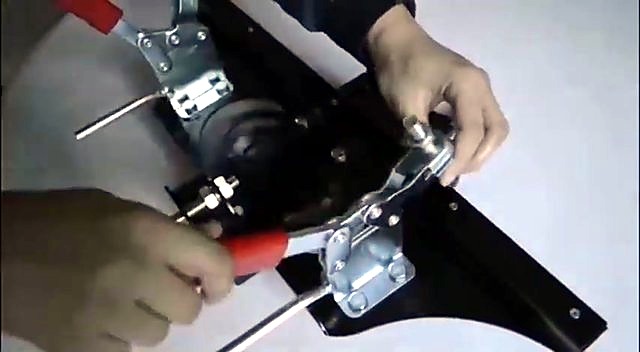 Red toggle clamp locked on wing (SKU ask)