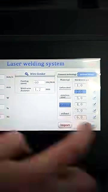 Laser welding system UI — wire feeder + material presets (SKU ask)