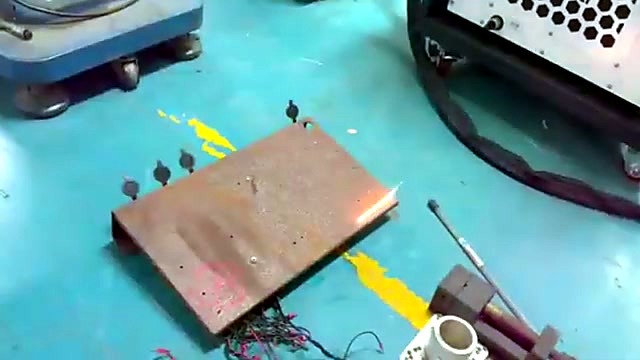 Handheld fibre cleaning strip on rusted plate (SKU ask)